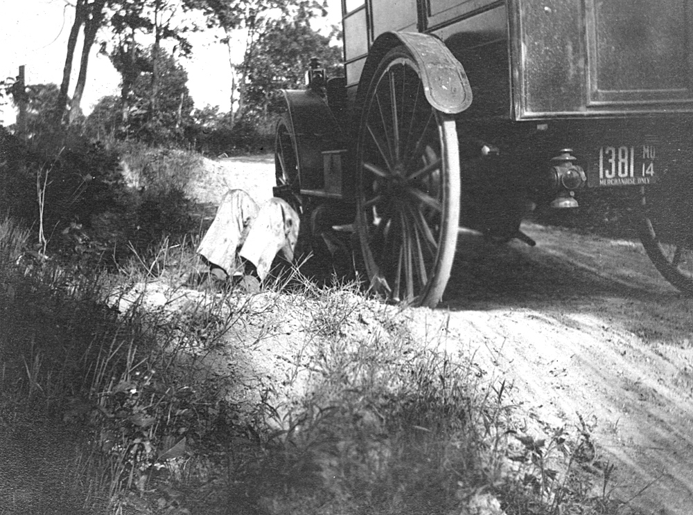 Image of WCFL book wagon stuck in a ditch