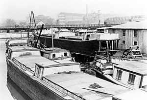 Boat Building with several canal boats docked