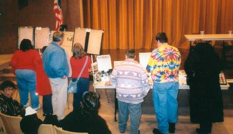 Students gather in hall to view items from Black History Month at Allegany College