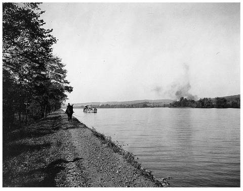 low-lying area beside the river called Big Pool; Boat being pulled by mule and rider with rope on tow path