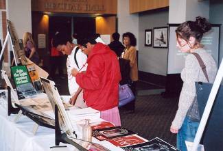 People gathered viewing items from MLK celebration at Frostburg State University