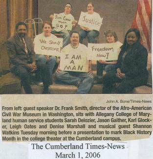 Students at Allegany College hold signs for photo from Black History Month