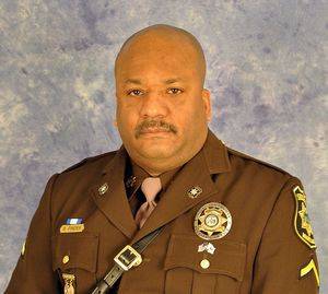 Formal portrait of man in Brown Maryland Sheriff's Uniform 2015