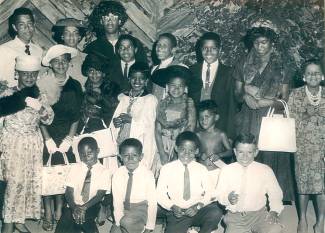 Group of children posing after Skit Night at Pine Avenue Playground