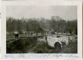 Photo of people gathering to view flood damage of lock 38 at Bridgeport, 1936 Flood