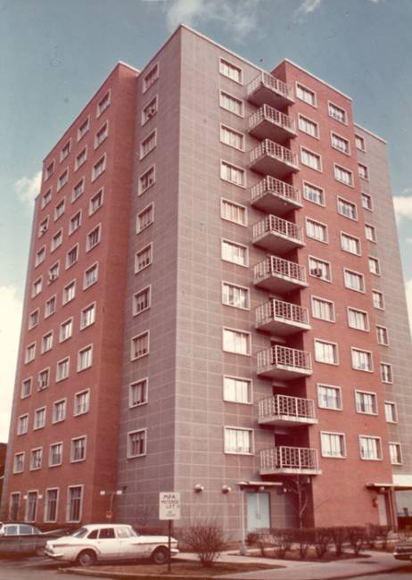 Photo of red brick high rise building
