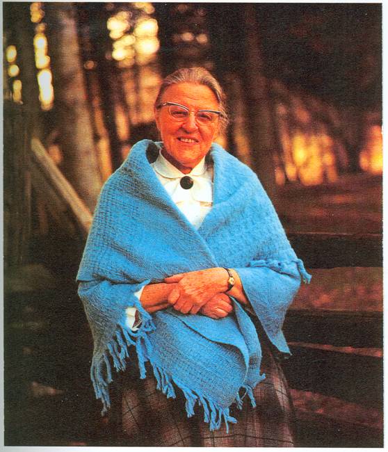 Photo of Alta Schrock outside wearing bright blue shaw