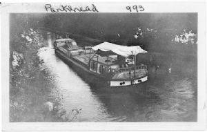 Photo of canal boat in river; text written "Parkhead 993"