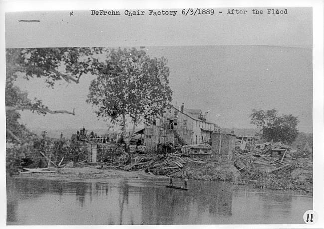 DeFrehn Chair factory was taken after the 1889 flood, debris throughout near the building