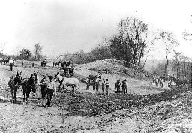 Men and mules used to level and move dirt during the repairs at Big Pool