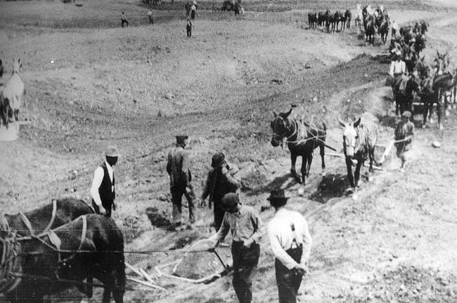 Men and mules used to level and move dirt during the repairs at Big Pool, pic 2