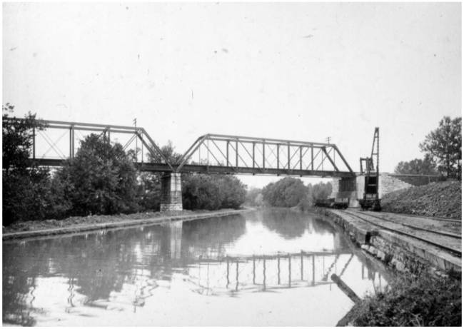 Canal and the wharf, and the bridge of Cumberland Valley Railroad on the line from Hagerstown to Martinsburg, circa 1910