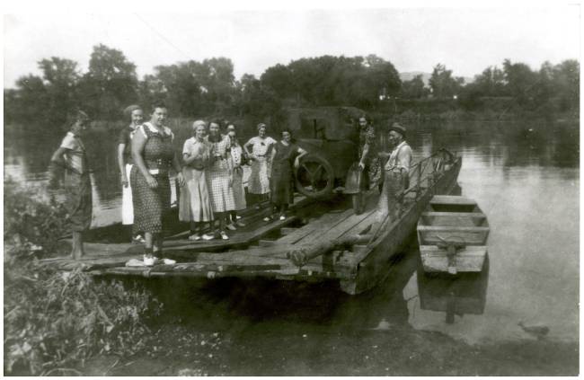Ferry at Big Pool; group of 10 women cross with car on ferry, circa 1936