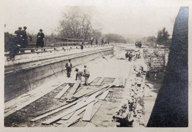 Repairs being carried out on the wall of the Conococheague Aqueduct, circa 1920s?