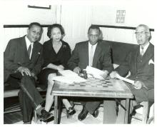 Romaine Franklin at table with 2 men and a woman