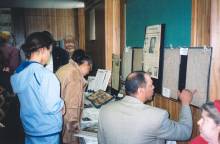 Group of people viewing Black History Month articles at Allegany College