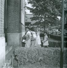 4 young girls walking into integrated school circa 1955 