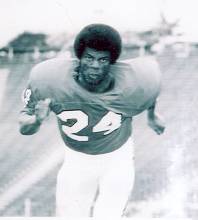 Photo of football player running pose