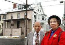 William O. Lee Jr. and Alfernia Dailey pose for photo on corner of of Ice and West All Saints streets, Frederick MD