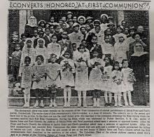 Newspaper clipping of group of children at first communion
