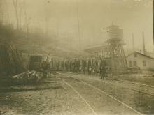 Image of Jackson mine with workers outside entrance