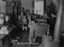 Group of children inside of Keedysville book deposit station