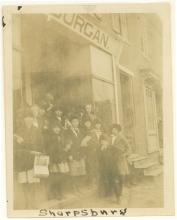 Group of children standing outside of Sharpsburg station