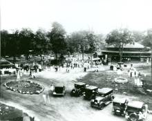 Photo circa 1920s depiction of People's Park; cars and people gathering for celebration