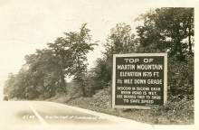 Postcard with sign of "Top of Martin Mountain" - US 40 9 miles east of Cumberland Md
