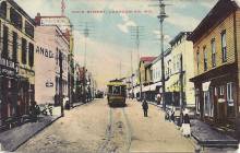 Postcard of Lonaconing circa 1910s; street trolley in the middle of the road on tracks