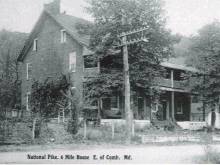 House on Hill titled National Pike. 6 Mile House E. of Cumb. Md.