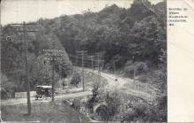 Circa 1915s postcard of car descending down Negro Mountain