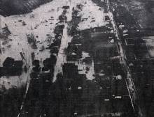 Aerial view of town of Hancock and homes underwater during 1936 Flood