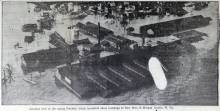 Overhead photograph of homes and businesses under water from 1936 flood in Paw Paw, WV