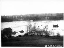 Image of Potomac River during 1936 flood; homes under water 