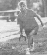 Photo of Mary Eversole playing horseshoes 