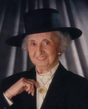 Professional photo of Katherine E. Stangel wearing a black rim hat
