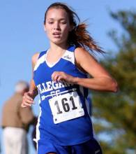 Photo of girl running with racers number on front; Lauryn MacFawn