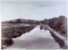 Image of canal with a boat off in the distance