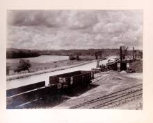 Canal looking upstream at Williamsport. Foreground are railcars waiting to be filled with coal for transport