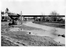 Drained canal at Williamsport, 2 boats sit in dry canal, several people walking on tow path, circa 1920s?