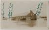 Photo of Cushwa warehouse surrounded by water during 1936 Flood; markings of building written on photo