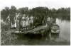 Ferry at Big Pool; group of 10 women cross with car on ferry, circa 1936