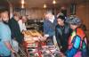 People gathered viewing items from Black History display at Fulton Myers Post #153