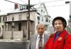 William O. Lee Jr. and Alfernia Dailey pose for photo on corner of of Ice and West All Saints streets, Frederick MD