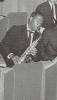Clipped photo of young man playing a saxaphone