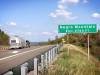 Photo from Interstate 68 of green Negro Mountain Elav 2740 ft sign